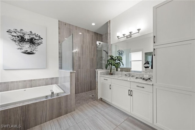 28617 Sicily Loop, Bonita Springs, FL 34135 - full bath with a bath, vanity, tile patterned flooring, and walk in shower