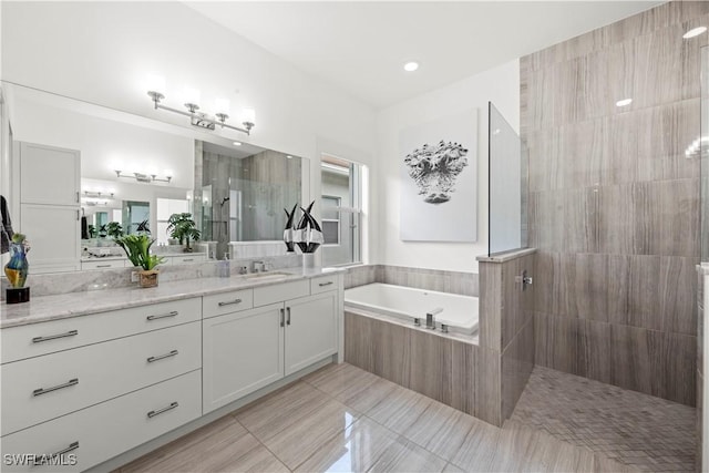 28617 Sicily Loop, Bonita Springs, FL 34135 - bathroom with a bath, vanity, a walk in shower, and tile patterned floors