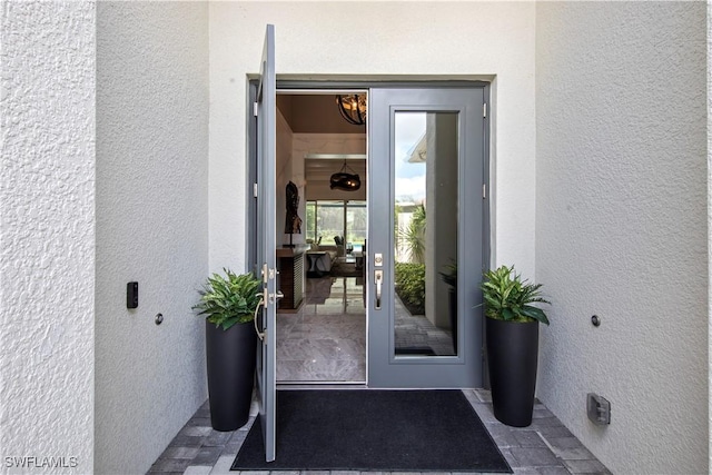 28617 Sicily Loop, Bonita Springs, FL 34135 - doorway to property featuring stucco siding