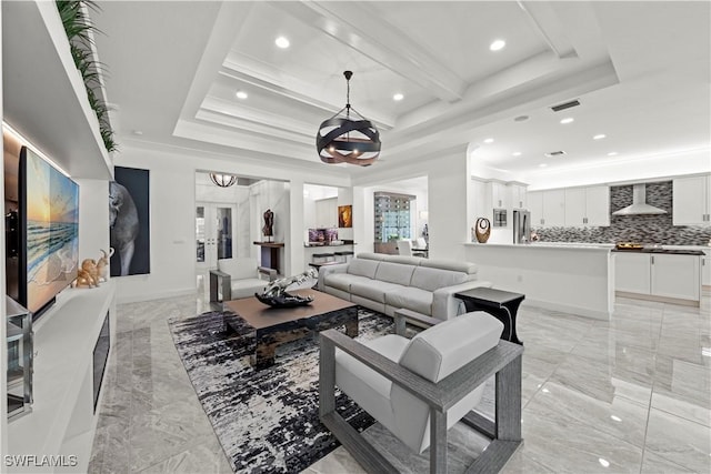 28617 Sicily Loop, Bonita Springs, FL 34135 - living area featuring light marble finish floors, a chandelier, recessed lighting, a tray ceiling, and crown molding
