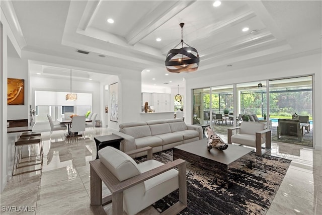 28617 Sicily Loop, Bonita Springs, FL 34135 - living room featuring light marble finish flooring, recessed lighting, and a raised ceiling