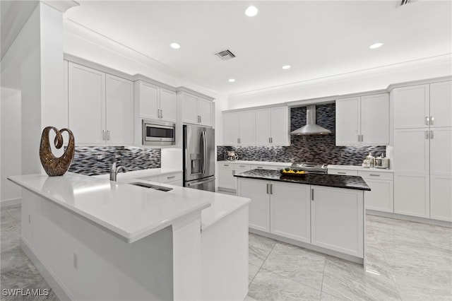 28617 Sicily Loop, Bonita Springs, FL 34135 - kitchen featuring appliances with stainless steel finishes, wall chimney range hood, backsplash, light marble finish flooring, and recessed lighting
