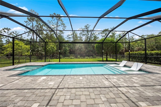 28617 Sicily Loop, Bonita Springs, FL 34135 - view of swimming pool with a pool with connected hot tub, a patio, and a lanai