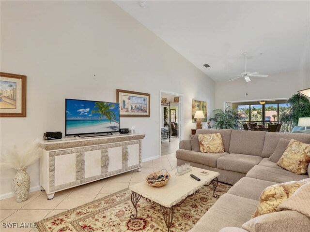 6790 Beach Resort Dr Unit 14, Naples, FL 34114 - living room featuring high vaulted ceiling, light tile patterned floors, and a ceiling fan
