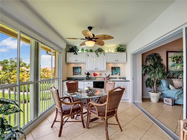 6790 Beach Resort Dr Unit 14, Naples, FL 34114 - dining room with light tile patterned floors and ceiling fan