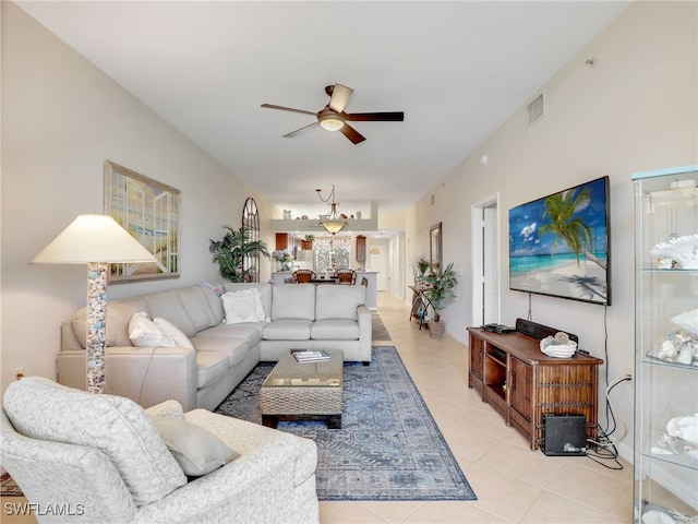 6790 Beach Resort Dr Unit 13, Naples, FL 34114 - living area with a ceiling fan and light tile patterned floors