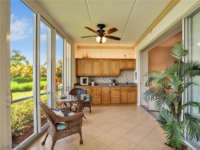 6790 Beach Resort Dr Unit 13, Naples, FL 34114 - sunroom / solarium featuring a textured ceiling and tile patterned floors