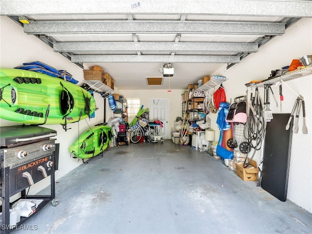 6790 Beach Resort Dr Unit 13, Naples, FL 34114 - garage with a garage door opener