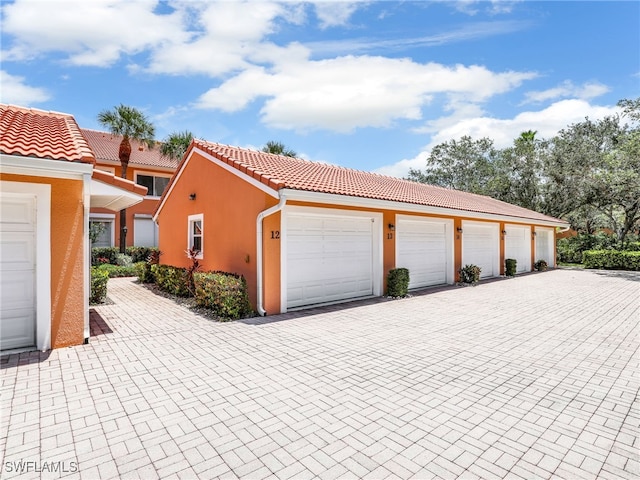 6790 Beach Resort Dr Unit 13, Naples, FL 34114 - view of garage