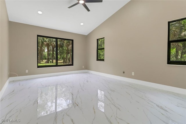 431 1st St NW, Naples, FL 34120 - spare room featuring marble tiled flooring, plenty of natural light, a ceiling fan, recessed lighting, and vaulted ceiling
