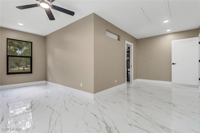 431 1st St NW, Naples, FL 34120 - empty room featuring marble tiled flooring, recessed lighting, ceiling fan, and attic access
