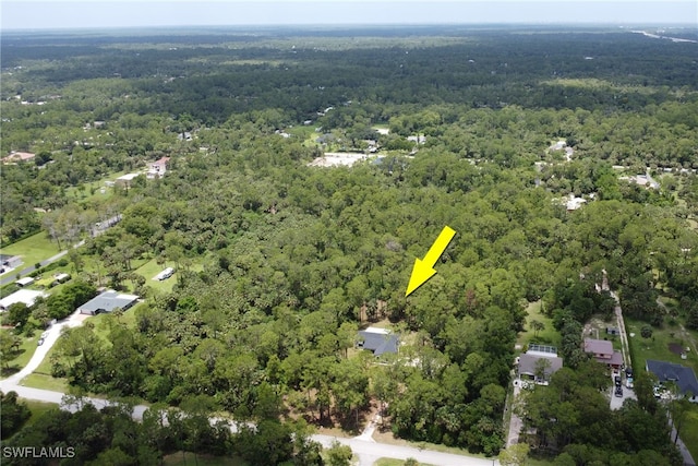 431 1st St NW, Naples, FL 34120 - aerial view of property's location featuring a heavily wooded area