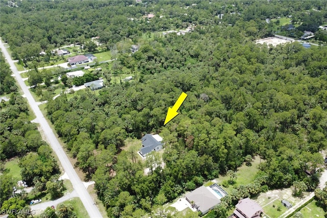 431 1st St NW, Naples, FL 34120 - aerial overview of property's location featuring a forest