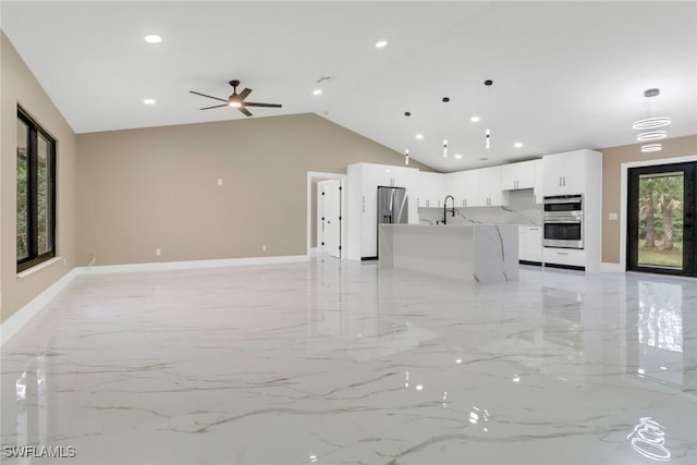 431 1st St NW, Naples, FL 34120 - unfurnished living room featuring lofted ceiling, light marble finish flooring, recessed lighting, and ceiling fan