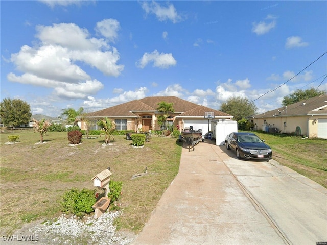 1018 Chapel Ave, Lehigh Acres, FL 33971 - single story home with a front yard and driveway
