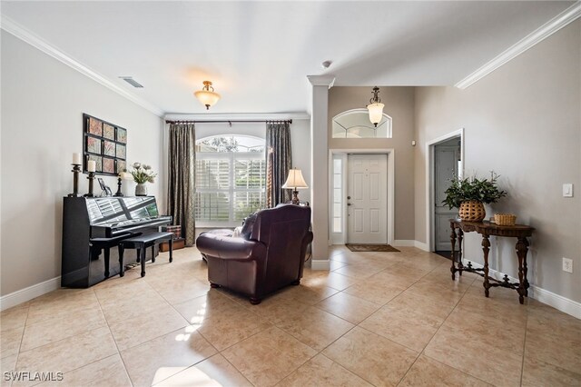 12977 Turtle Cove Trl, North Fort Myers, FL 33903 - entryway with ornamental molding and light tile patterned flooring