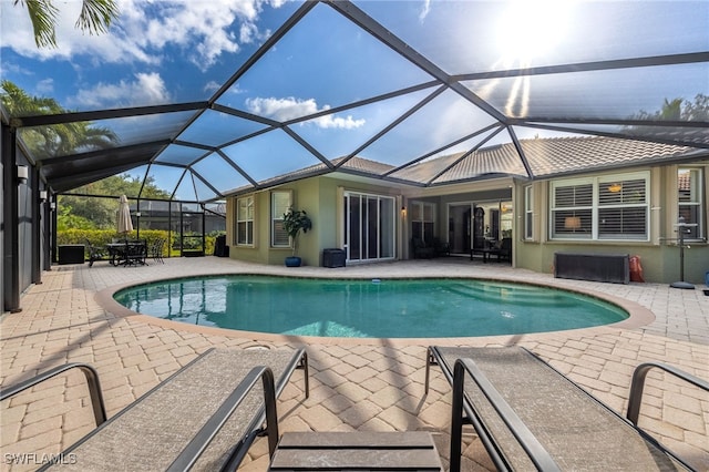 12977 Turtle Cove Trl, North Fort Myers, FL 33903 - swimming pool with a patio and a lanai
