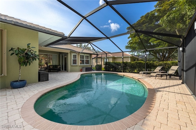 12977 Turtle Cove Trl, North Fort Myers, FL 33903 - swimming pool featuring a patio