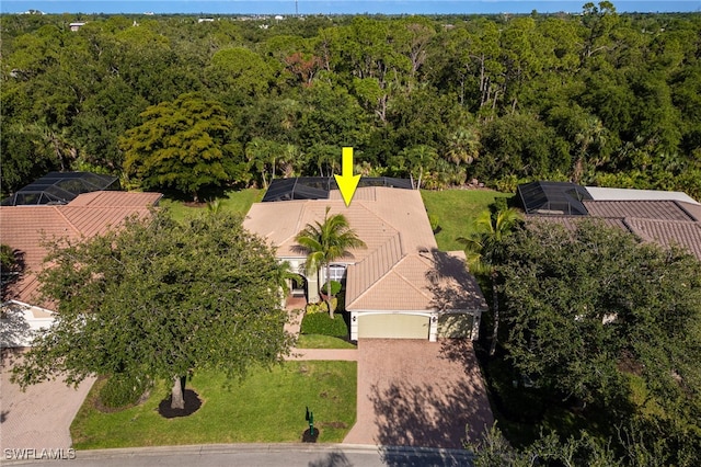 12977 Turtle Cove Trl, North Fort Myers, FL 33903 - aerial view of property and surrounding area featuring a forest