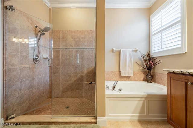 12977 Turtle Cove Trl, North Fort Myers, FL 33903 - bathroom with a stall shower, a bath, ornamental molding, tile patterned flooring, and vanity