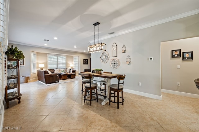 12977 Turtle Cove Trl, North Fort Myers, FL 33903 - dining room with ornamental molding, light tile patterned flooring, and recessed lighting