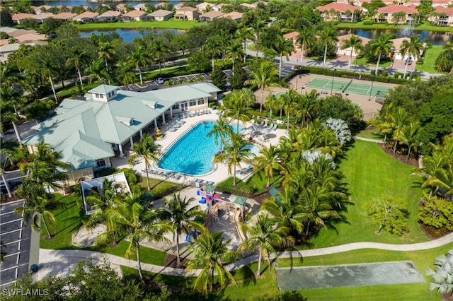 12977 Turtle Cove Trl, North Fort Myers, FL 33903 - aerial perspective of suburban area with a pool area and a nearby body of water