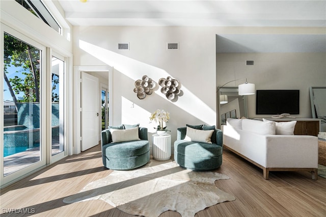 5203 Starfish Ave, Naples, FL 34103 - living area featuring wood finished floors and a high ceiling
