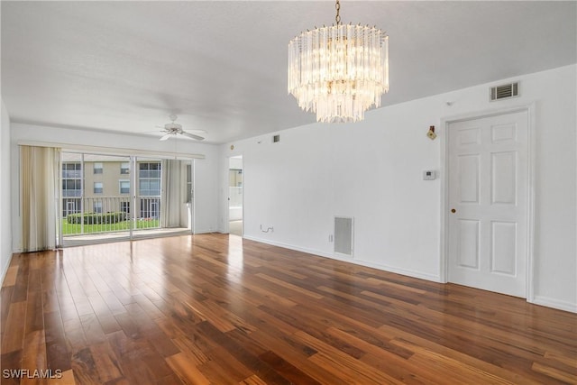 9650 Victoria Ln Unit 201B, Naples, FL 34109 - unfurnished room featuring a chandelier, wood finished floors, and a ceiling fan