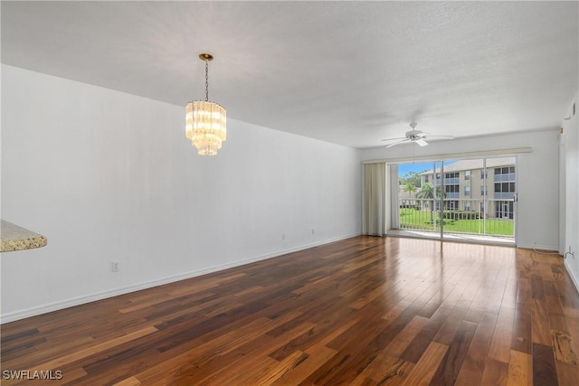 9650 Victoria Ln Unit 201B, Naples, FL 34109 - unfurnished room featuring a chandelier, hardwood / wood-style floors, and ceiling fan