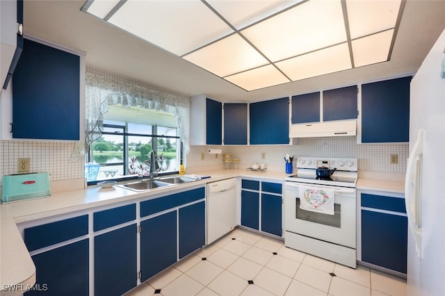 113 Picardy Ct, Naples, FL 34112 - kitchen with white appliances, ventilation hood, blue cabinets, and backsplash