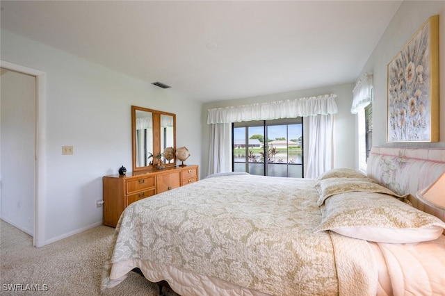 113 Picardy Ct, Naples, FL 34112 - carpeted bedroom with baseboards and a water view