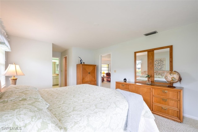 113 Picardy Ct, Naples, FL 34112 - bedroom featuring carpet, multiple windows, and ensuite bathroom