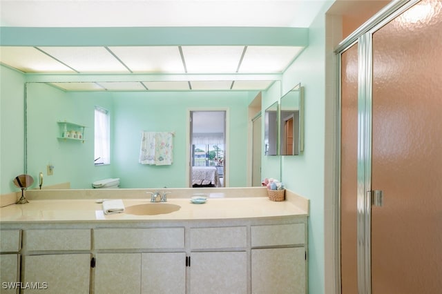 113 Picardy Ct, Naples, FL 34112 - ensuite bathroom featuring vanity and a stall shower