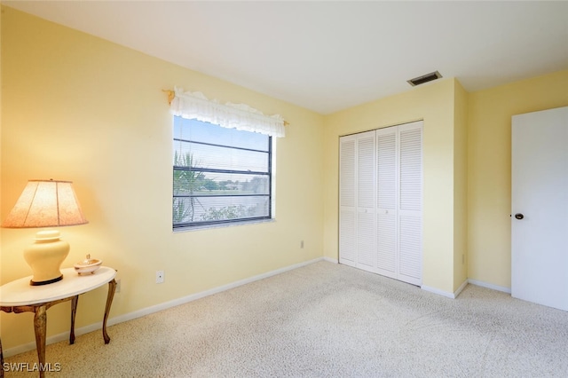 113 Picardy Ct, Naples, FL 34112 - bedroom with carpet floors and a closet