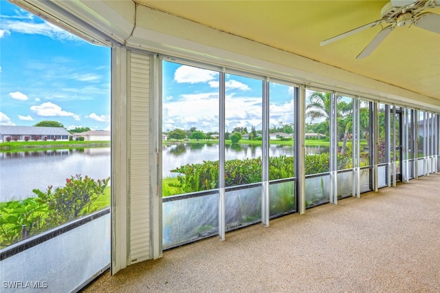113 Picardy Ct, Naples, FL 34112 - unfurnished sunroom featuring a water view and a ceiling fan