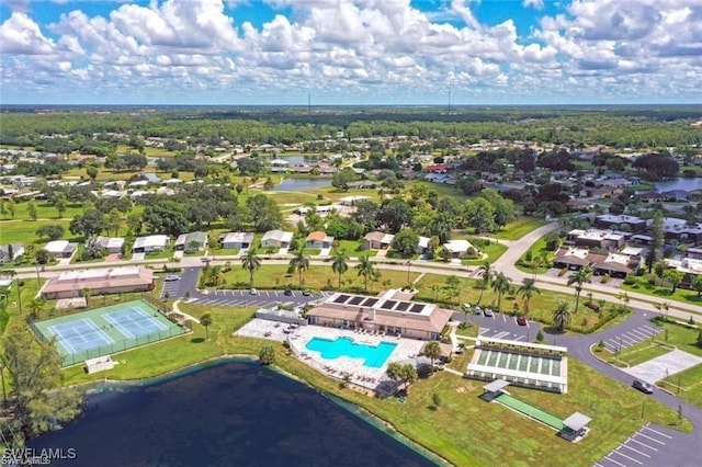 113 Picardy Ct, Naples, FL 34112 - aerial overview of property's location featuring a large body of water and nearby suburban area