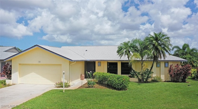 113 Picardy Ct, Naples, FL 34112 - ranch-style house featuring a garage, stucco siding, driveway, and a front lawn
