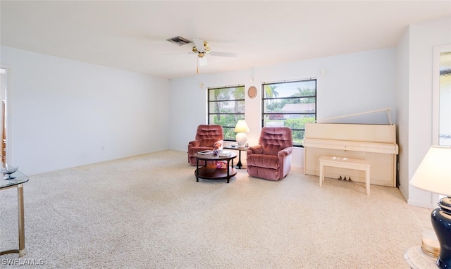 113 Picardy Ct, Naples, FL 34112 - living area with ceiling fan and carpet floors