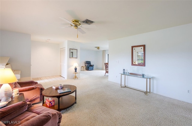 113 Picardy Ct, Naples, FL 34112 - living room featuring ceiling fan and carpet flooring
