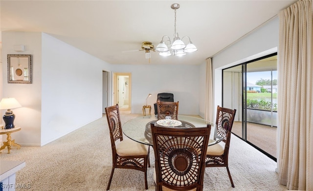 113 Picardy Ct, Naples, FL 34112 - dining space with light carpet, a chandelier, and a ceiling fan