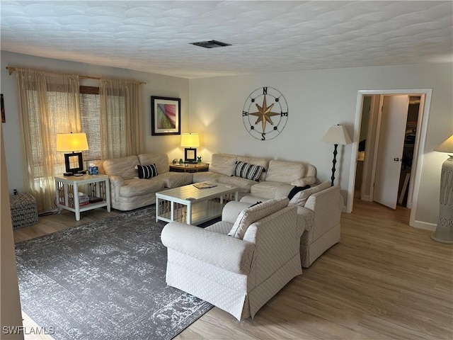 120 Bay Mar Dr, Fort Myers Beach, FL 33931 - living area featuring wood finished floors