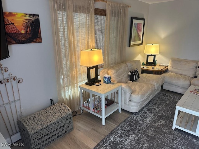 120 Bay Mar Dr, Fort Myers Beach, FL 33931 - living area with wood finished floors and plenty of natural light