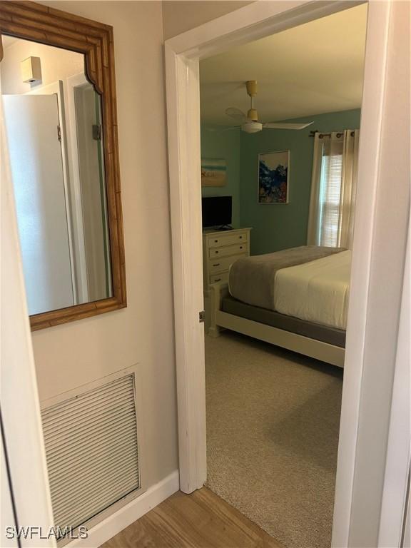 120 Bay Mar Dr, Fort Myers Beach, FL 33931 - bedroom with baseboards and wood finished floors