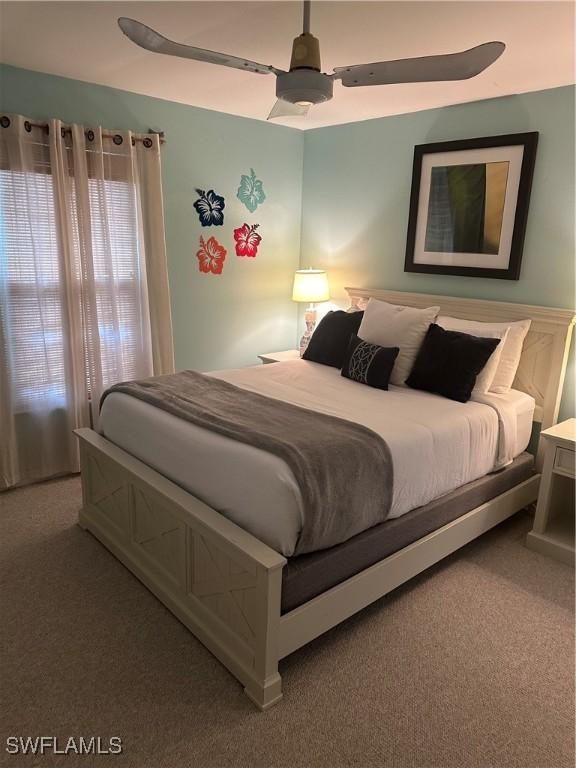 120 Bay Mar Dr, Fort Myers Beach, FL 33931 - carpeted bedroom with ceiling fan