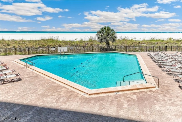 180 Seaview Ct Unit 507, Marco Island, FL 34145 - community pool with view of water and beach