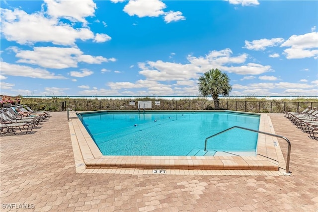 180 Seaview Ct Unit 507, Marco Island, FL 34145 - community pool featuring a patio