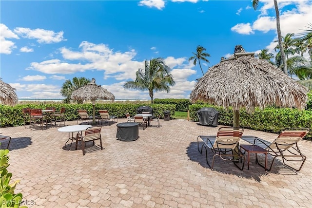 180 Seaview Ct Unit 507, Marco Island, FL 34145 - view of patio / terrace with a grill
