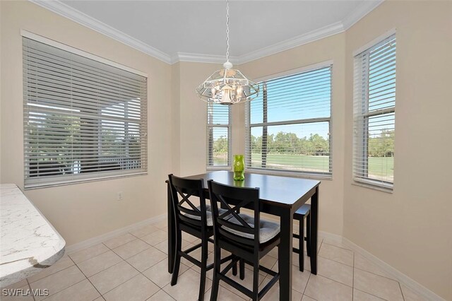 8610 Cedar Hammock Cir Unit 1223, Naples, FL 34112 - dining area with a chandelier, healthy amount of natural light, ornamental molding, and light tile patterned flooring