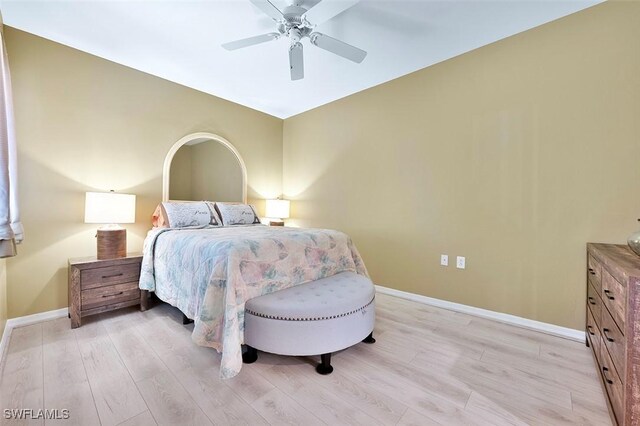 8610 Cedar Hammock Cir Unit 1223, Naples, FL 34112 - bedroom featuring light wood-style floors and a ceiling fan