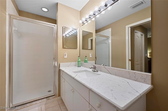 8610 Cedar Hammock Cir Unit 1223, Naples, FL 34112 - bathroom featuring vanity, a shower stall, and tile patterned flooring